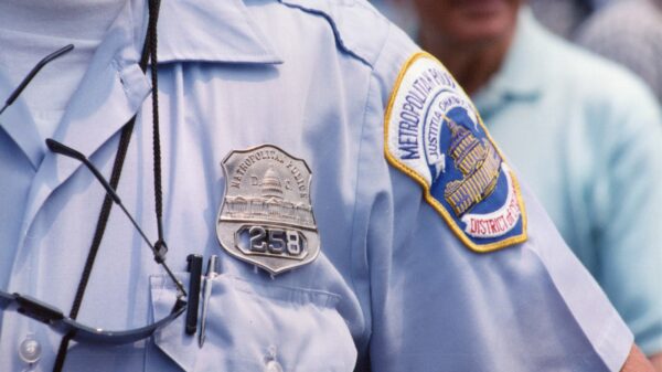 photo showing arm patch of MPD officer
