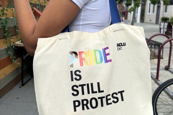 Pride is still protest tote bag