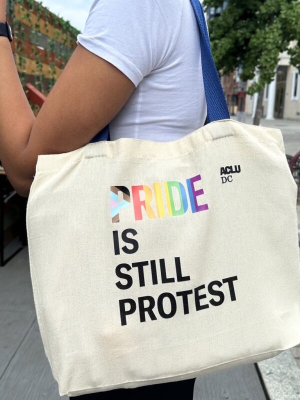 Pride is still protest tote bag