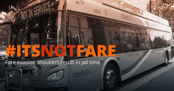 Photo of DC Metrobus with #ItsNotFare slogan, and says "Fare evasion should not result in jail time"