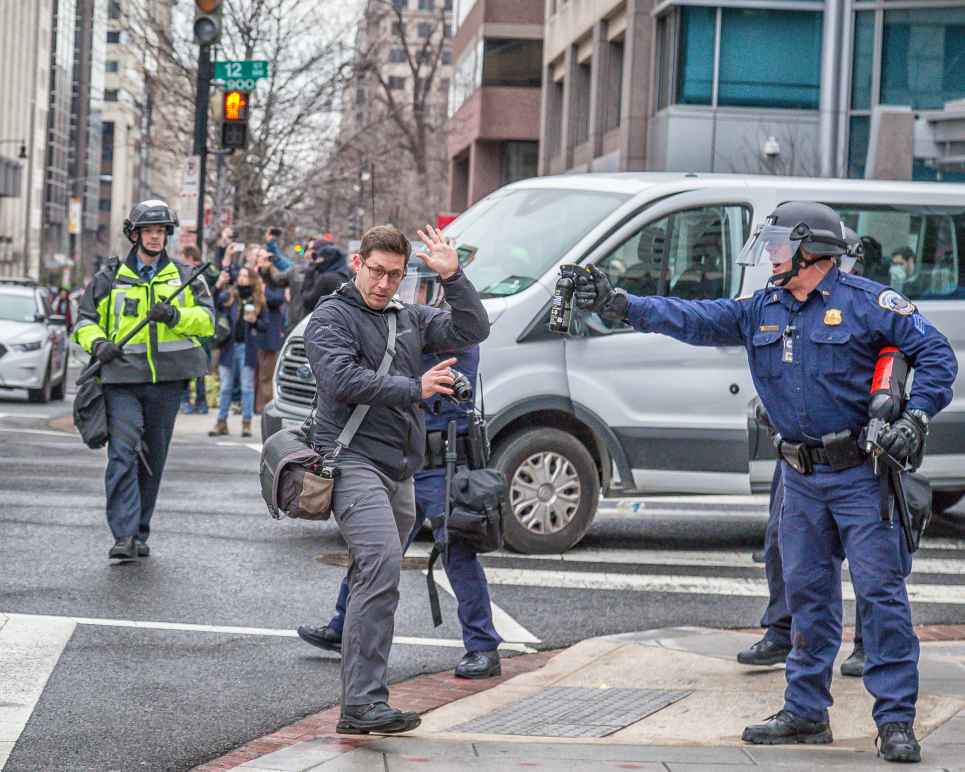 Police Menaces Photographer with Pepper-Spray