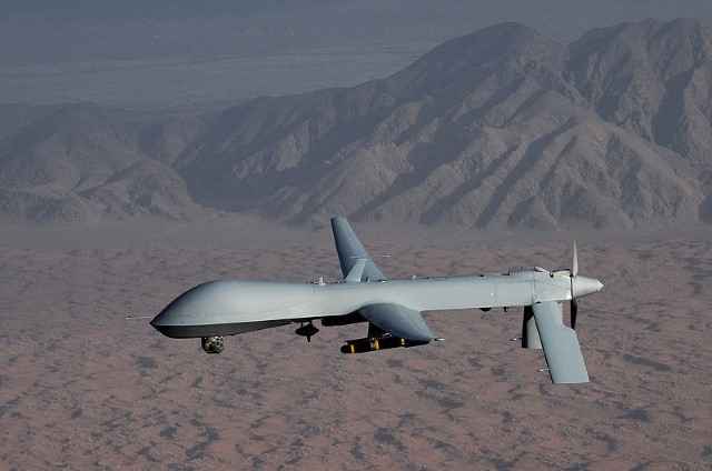 Image of a drone against a mountainous background