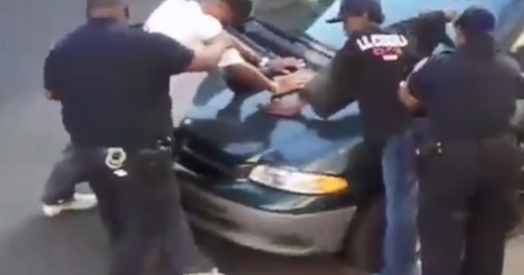 image of young black men being stopped and frisked by police