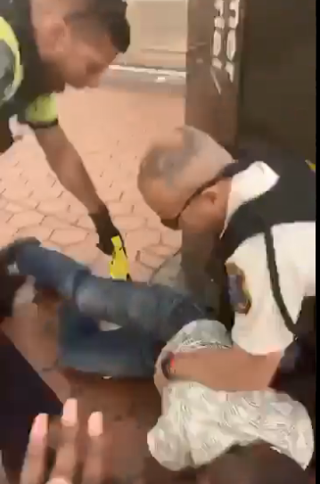 man being tasered by metro police