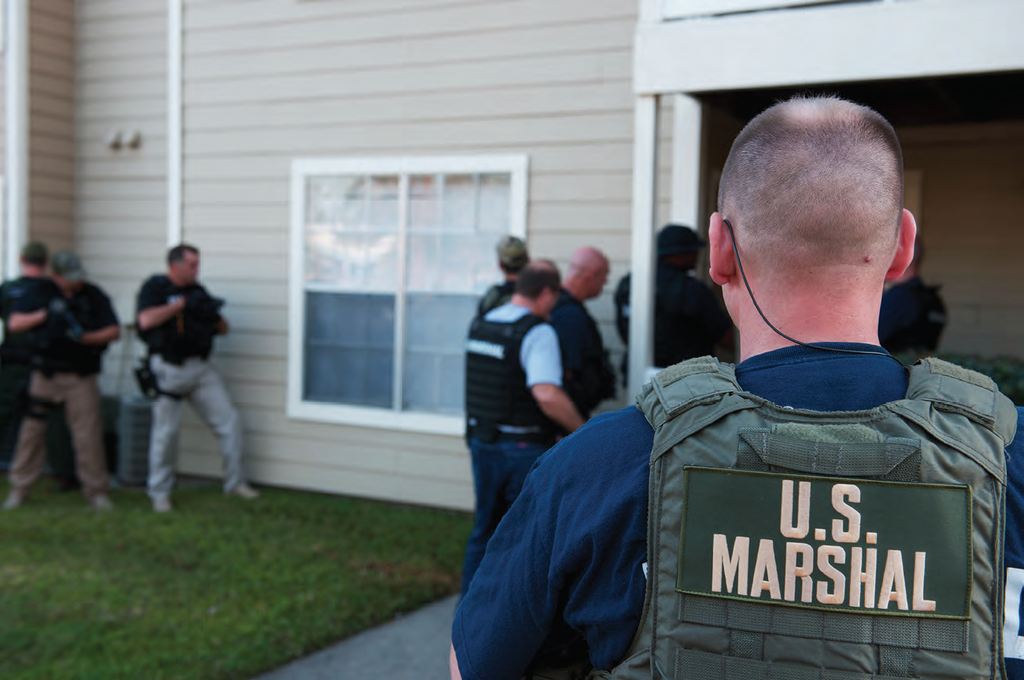 US Marshals enter building