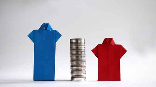 image of and blue shirt and a red shirt next to a stack of coins, representing the gender wage gap